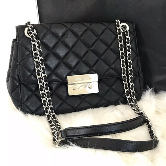 black and silver michael kors purse
